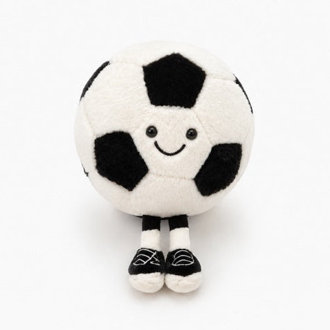 Plush toy shaped like a soccer ball with a smiling face on a white background